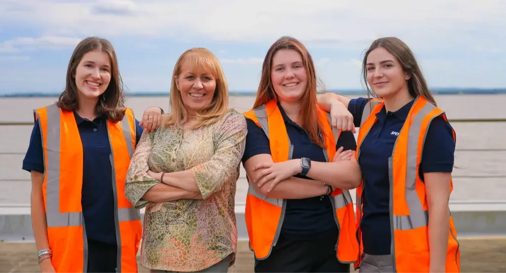 Yvonne Moir stood with the women from 2026's cohort of apprentices